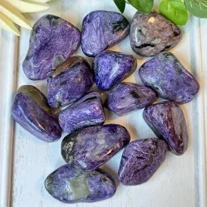 Charoite is a mesmerizing crystal that promotes spiritual awakening, intuition, and personal transformation, for crystal healing, meditation.