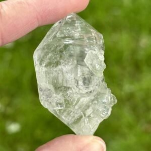 Discover rare Himalayan Quartz with Green Chlorite from Kulu Valley. Exceptional clarity, powerful healing, and spiritual growth in every crystal.