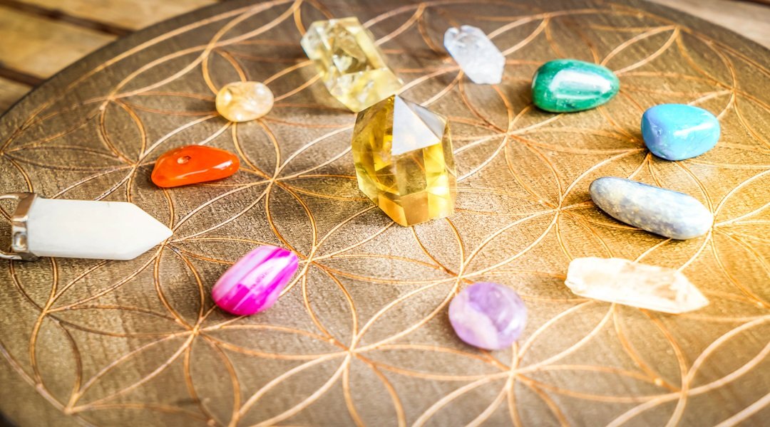 Healing crystals on brown background Healing crystals on brown background