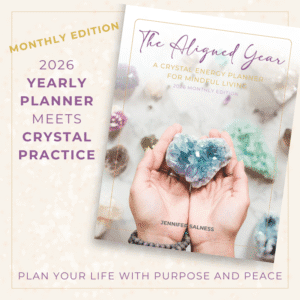The Aligned Year 2026 Weekly Planner with Celestite heart cover and gold border on ivory background.