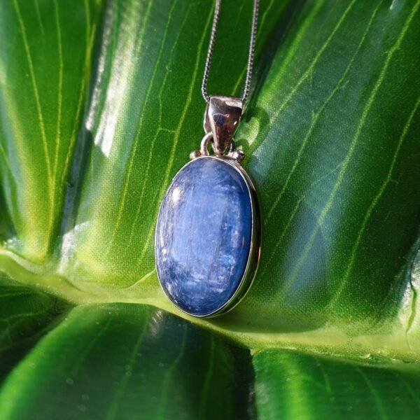 Blue Kyanite sterling silver pendant with shimmering blue crystal blade, handmade jewelry from India for clarity and communication
