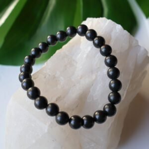 Shungite crystal bracelet with polished black 8mm beads, handmade energy protection jewelry for grounding and EMF shielding