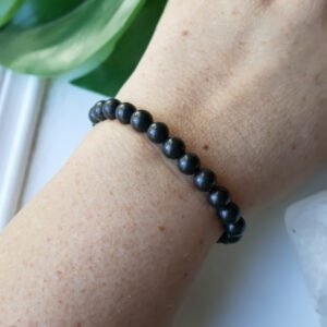 Shungite crystal bracelet with polished black 8mm beads, handmade energy protection jewelry for grounding and EMF shielding