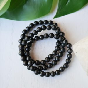 Shungite crystal bracelet with polished black 8mm beads, handmade energy protection jewelry for grounding and EMF shielding