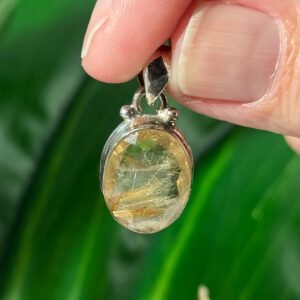 Gold Rutilated Quartz pendant in sterling silver. Inspires confidence, clarity, and radiant manifestation energy.