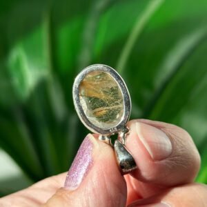 Gold Rutilated Quartz pendant in sterling silver. Inspires confidence, clarity, and radiant manifestation energy.