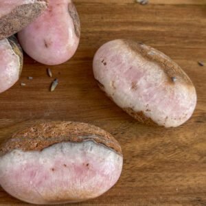 Pink Aragonite palm stone with soft pink and cream patterns, heart-healing crystal for emotional support and self-compassion