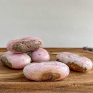 Pink Aragonite palm stone with soft pink and cream patterns, heart-healing crystal for emotional support and self-compassion