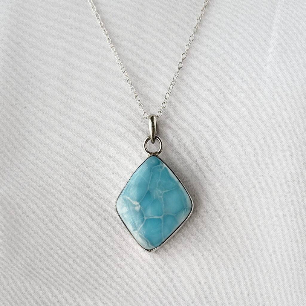 Larimar Sterling Silver Pendant from the Dominican Republic. Calming, heart-opening energy for compassion and clear expression.