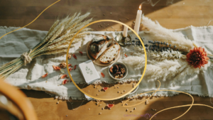 Fall wheat and botanicals on a table for a Crystals for Fall Simple Practices for a Mindful Reset blog